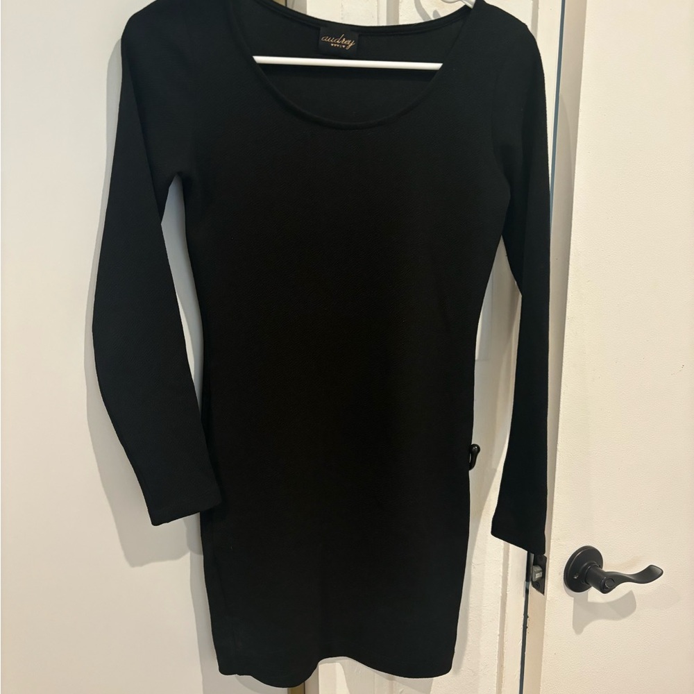 Women’s black, long sleeve form fitting dress